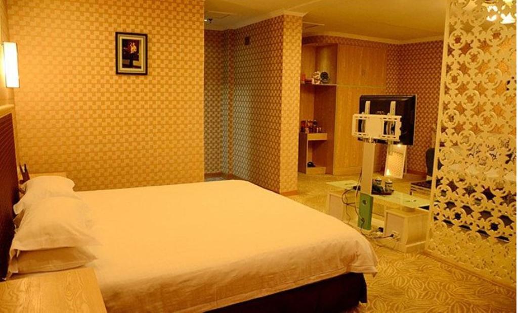 Omeiga Business Hotel Yiwu (Zhejiang) Chambre photo