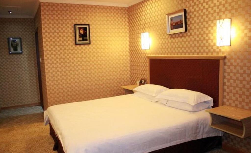 Omeiga Business Hotel Yiwu (Zhejiang) Chambre photo