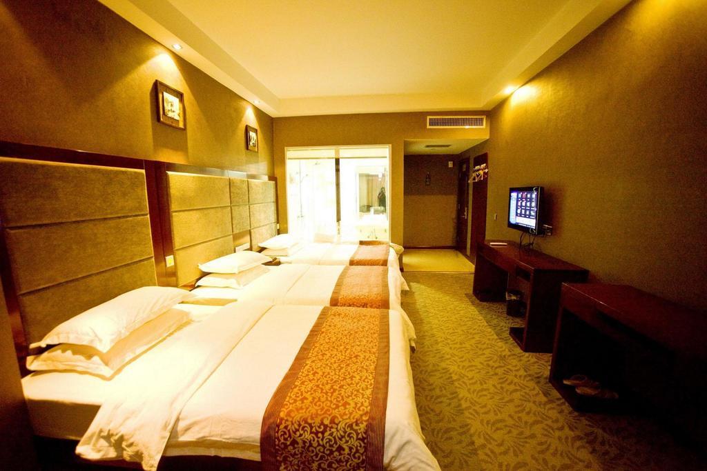 Omeiga Business Hotel Yiwu (Zhejiang) Chambre photo