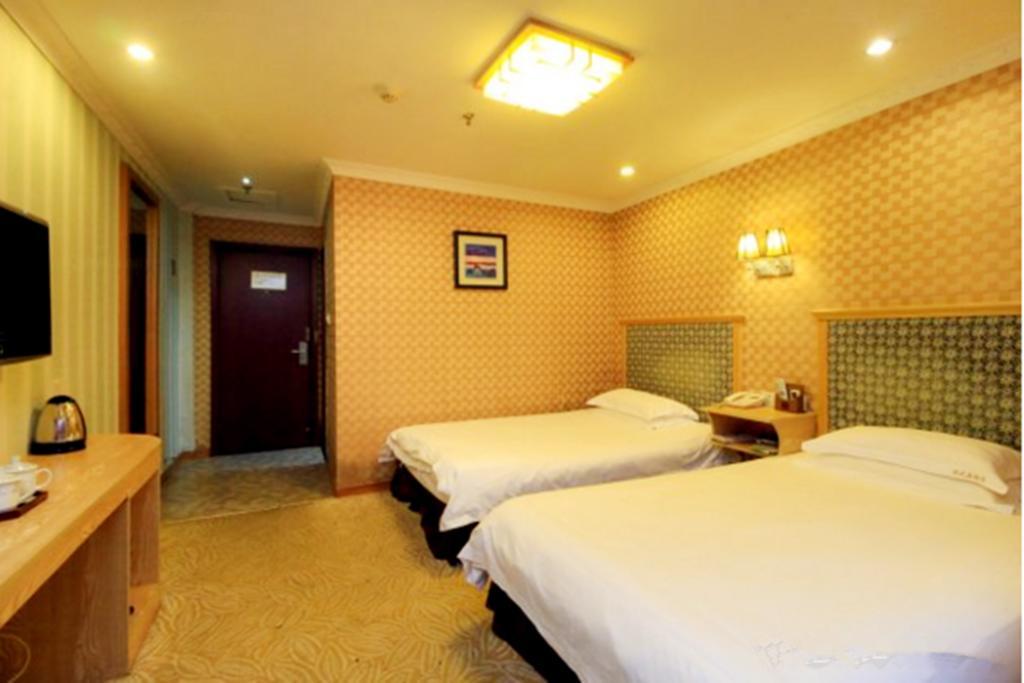 Omeiga Business Hotel Yiwu (Zhejiang) Extérieur photo